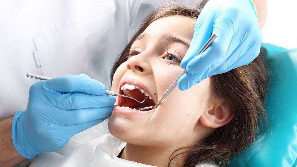 child getting dental sealants